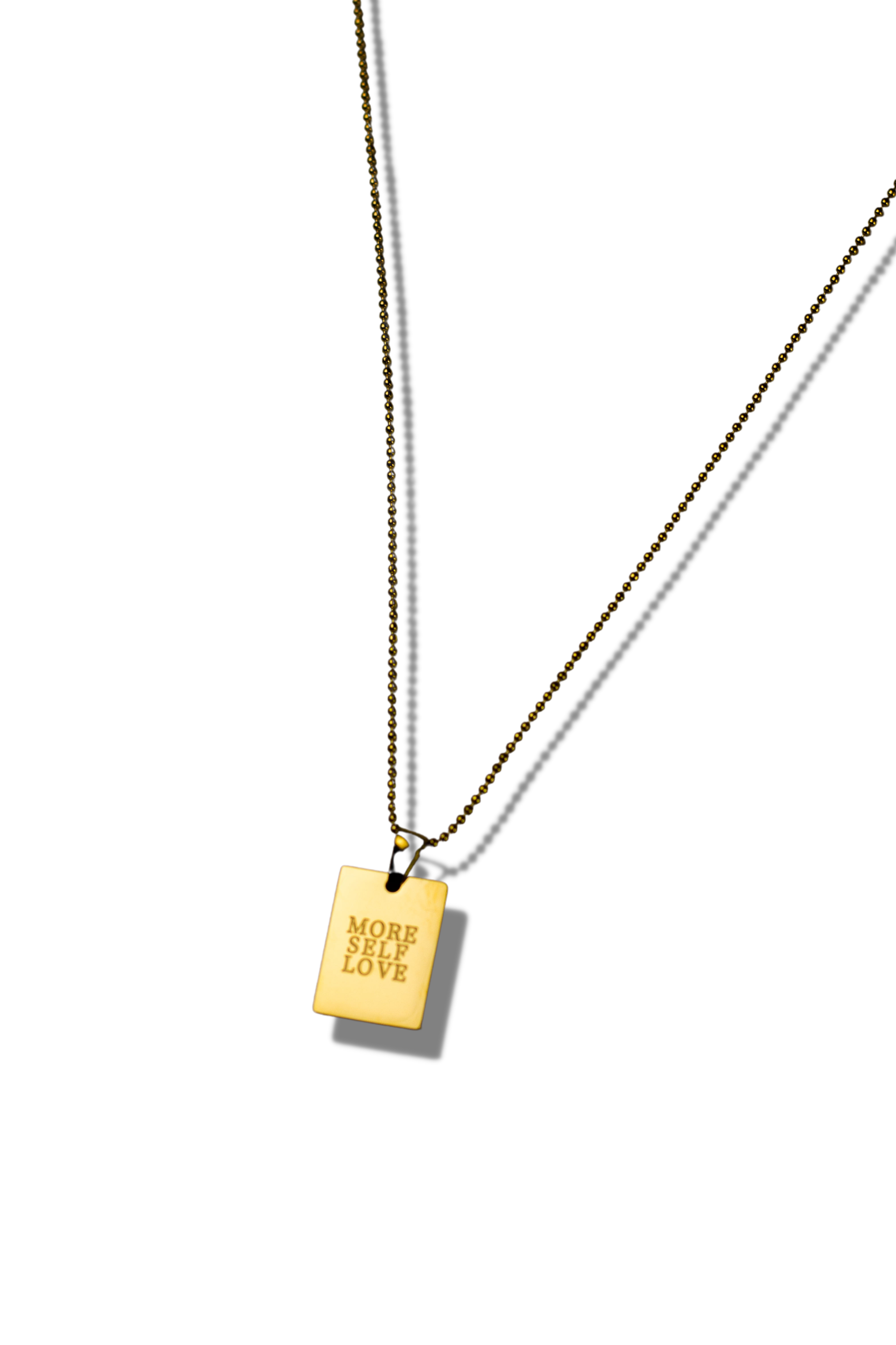 18k gold stainless steel chain necklace. Engraved in the necklace are the words "MORE SELF LOVE". E's Element "More Self Love" Chain Necklace by E's Element.