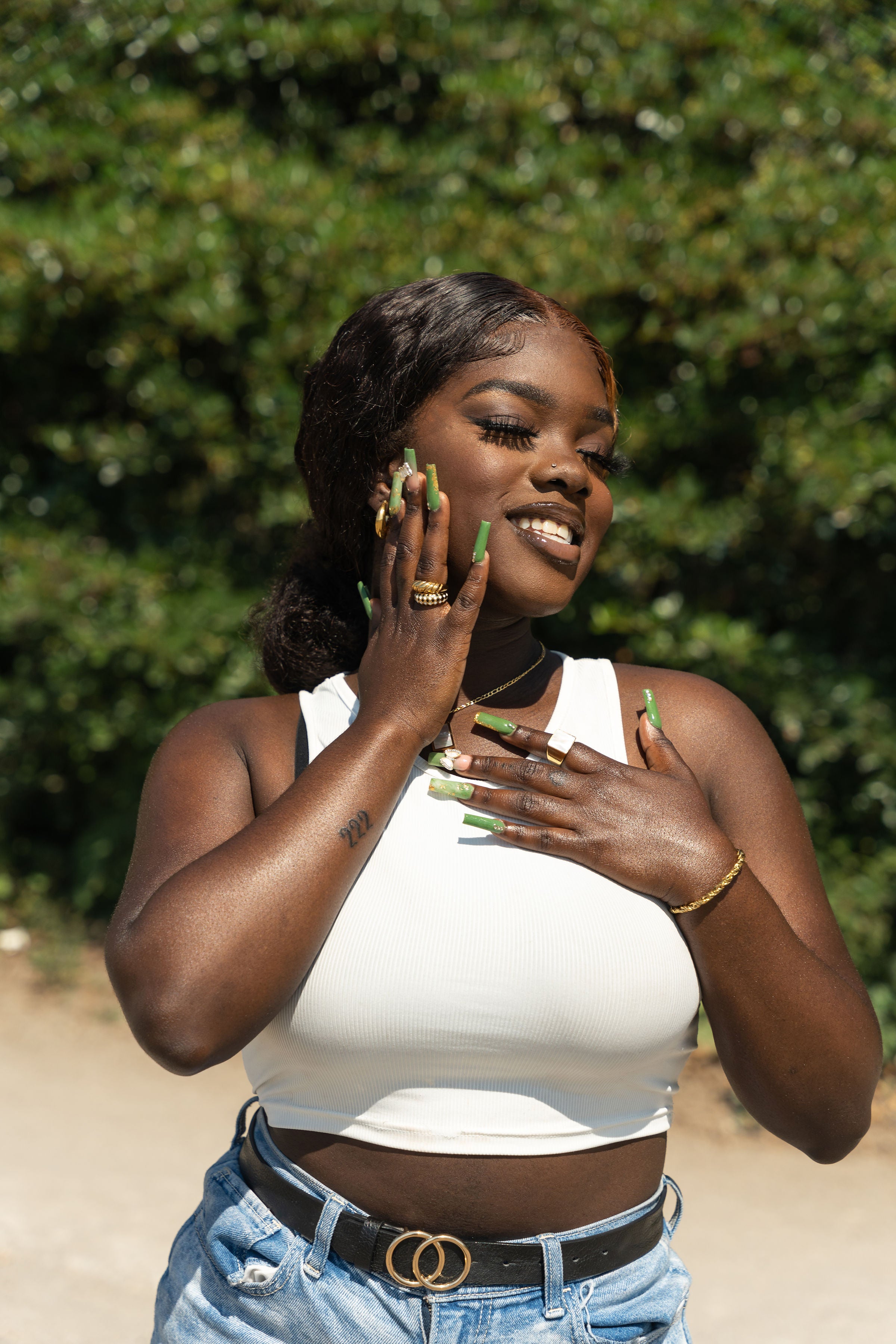 Woman in a white tank top wearing E's Element 6 piece set.