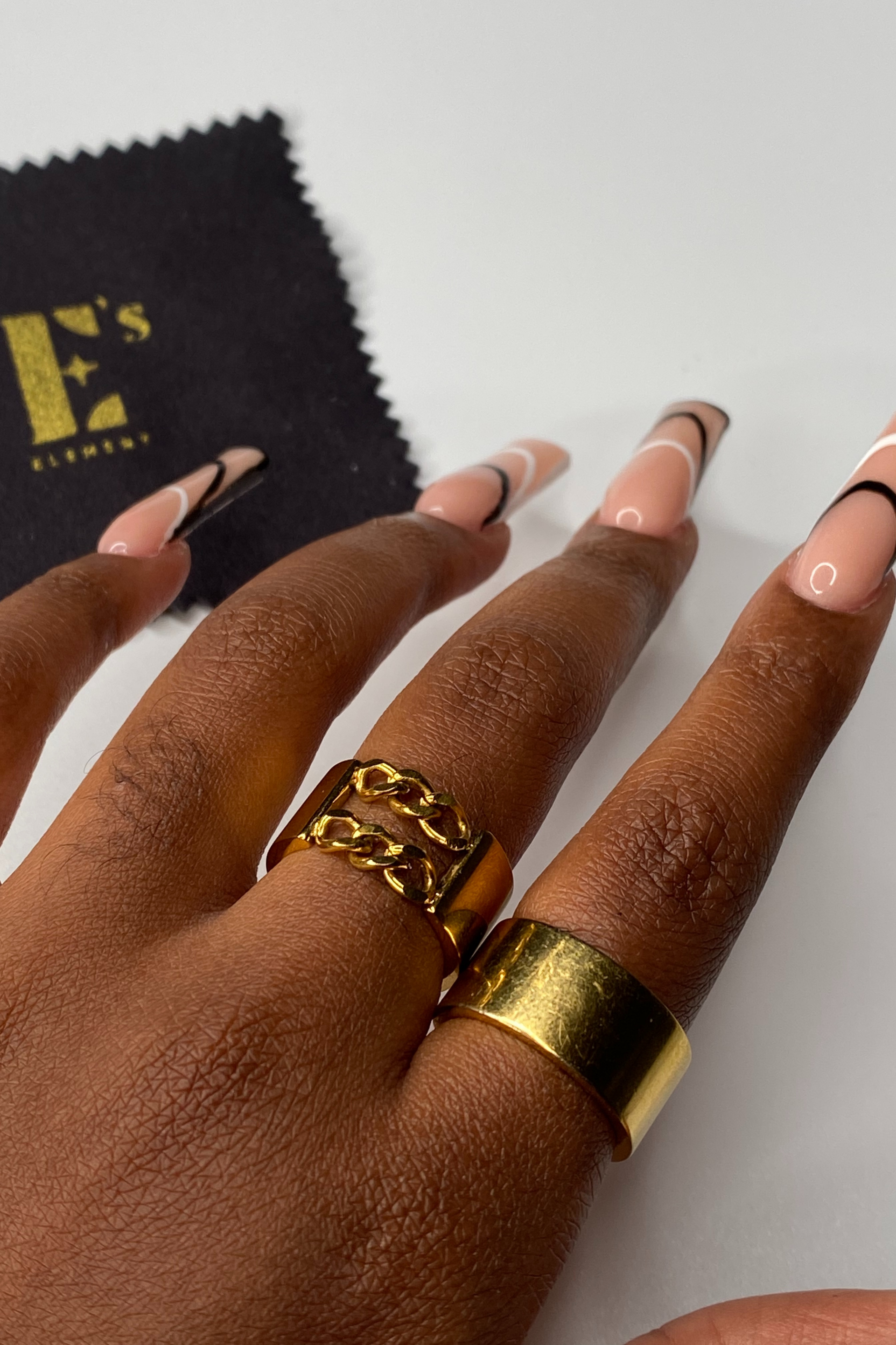 18k gold stainless steel rings worn on the middle and index finger. Double Band Stackable Ring (Upgraded) by E's Element.