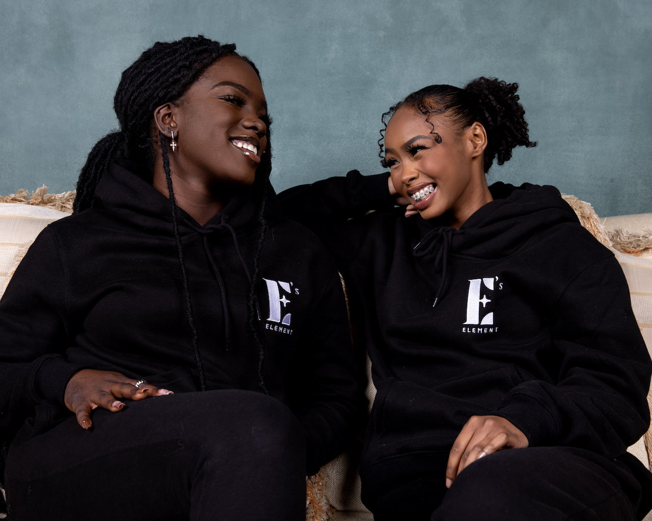 Go through the holiday gift guide to learn more. The E's Element Smokey Black Sweatsuit set is among the many perfect gifts this holiday. 