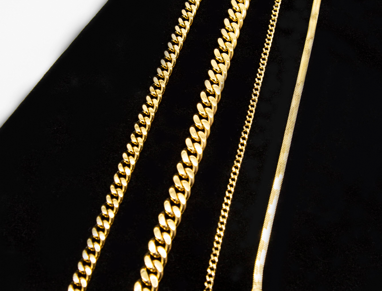 various necklace chains in gold