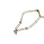 18k gold anklet with a heart shaped charm. Ella's Element Heart Charm Anklet by E's Element.