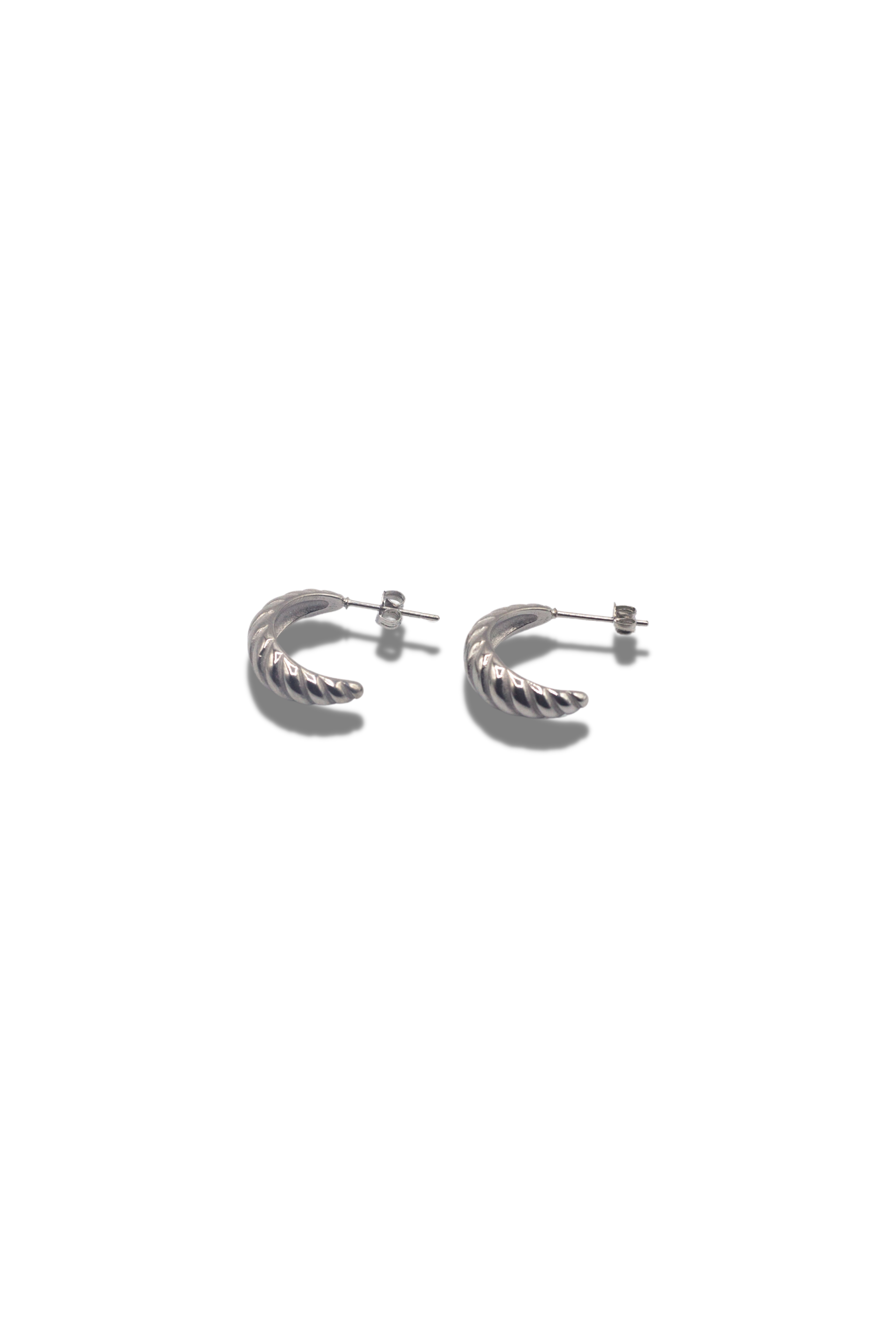 18k silver croissant shaped earrings. Thick Croissant Stud Earrings by E's Element.