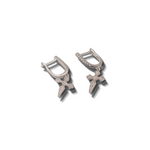 18k silver stainless steel earrings. The earrings have cross charms attached. Cross Cubic Zirconia Huggies by E's Element.