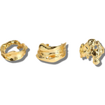 Three 18k gold molten rings placed side-by-side. Ella Lava Ring Trio (Set of 3) by E's Element.