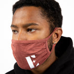 Model in a black hoodie wearing light brown reusable face mask. The face mask has the E's Element logo imprinted in white. Spice Face Mask by E's Element.