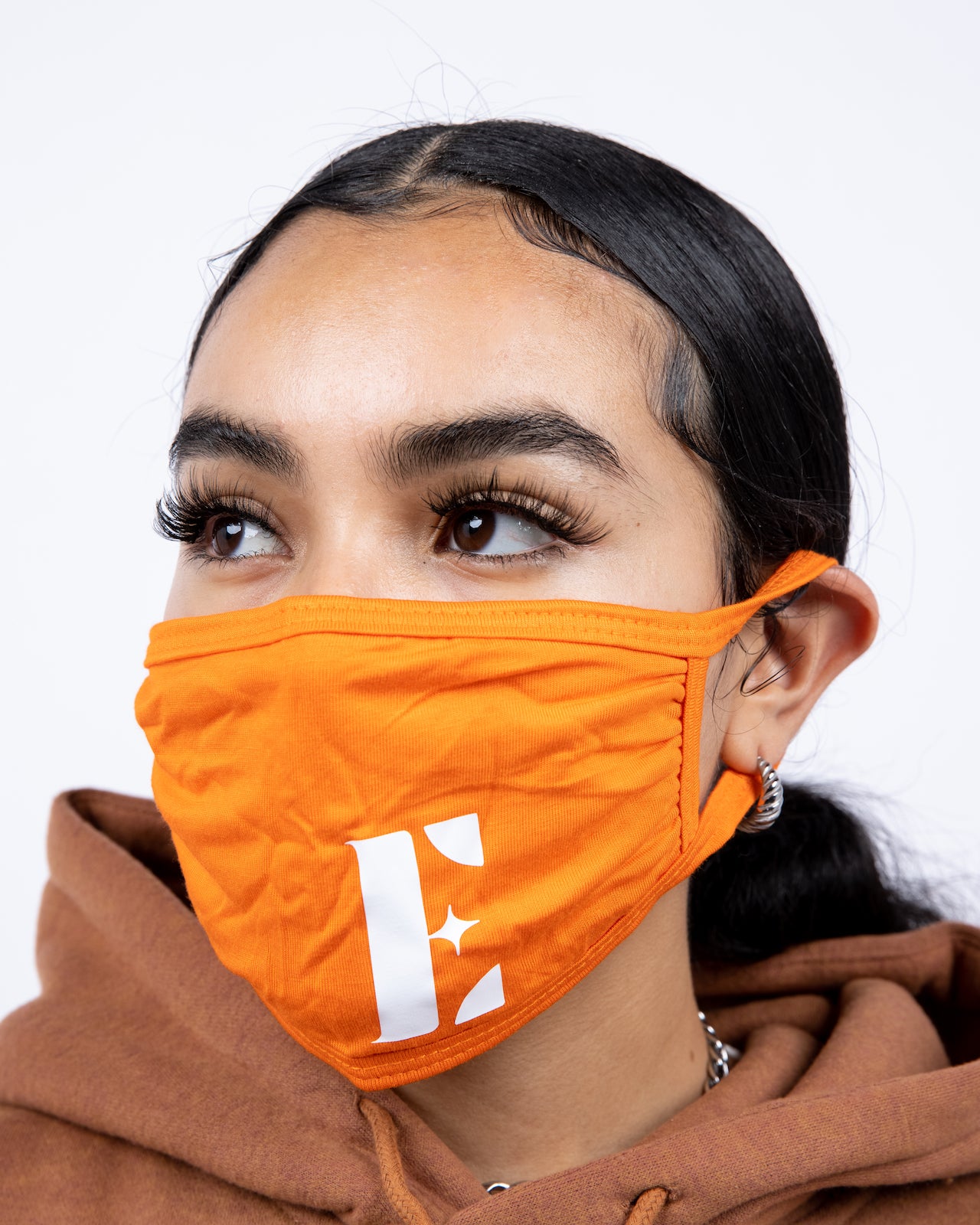 Woman wearing the Burnt Orange Face Mask by E's Element.