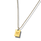 18k gold stainless steel chain necklace. Engraved in the necklace are the words "MORE SELF LOVE". E's Element "More Self Love" Chain Necklace by E's Element.
