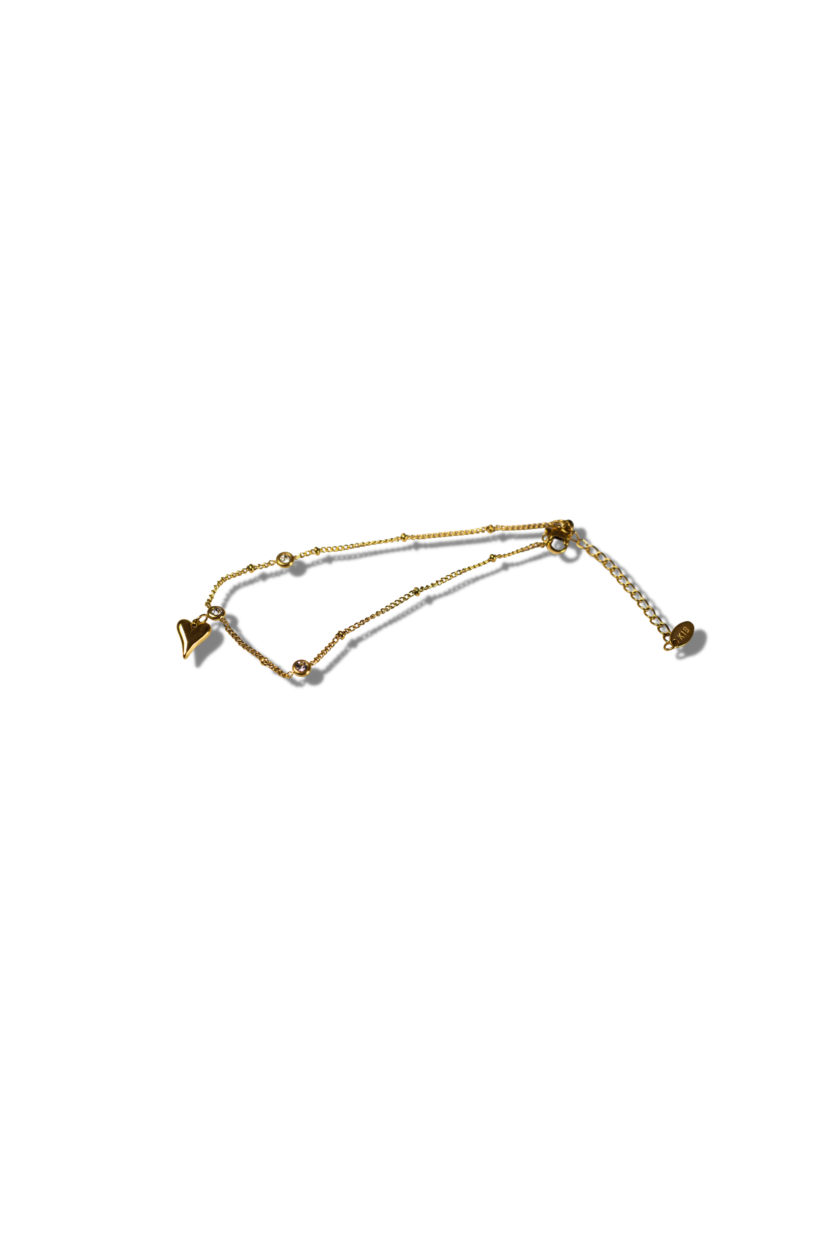 18k gold anklet with a heart shaped charm. Ella's Element Heart Charm Anklet by E's Element.