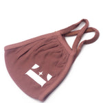 Pink face mask with the E's Element logo imprinted in white. Mauve Pink Face Mask by E's Element.