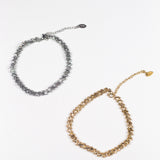 On the left is an 18k silver chain anklet. On the right is an 18k gold chain anklet. Ellina Link Chain Anklet by E's Element.
