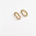 Two 18k gold rings with baguettes. Ella Tennis Ring by E's Element.