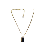 18k gold necklace with a black rectangular charm. The Infinity Zircon Necklace by E's Element.