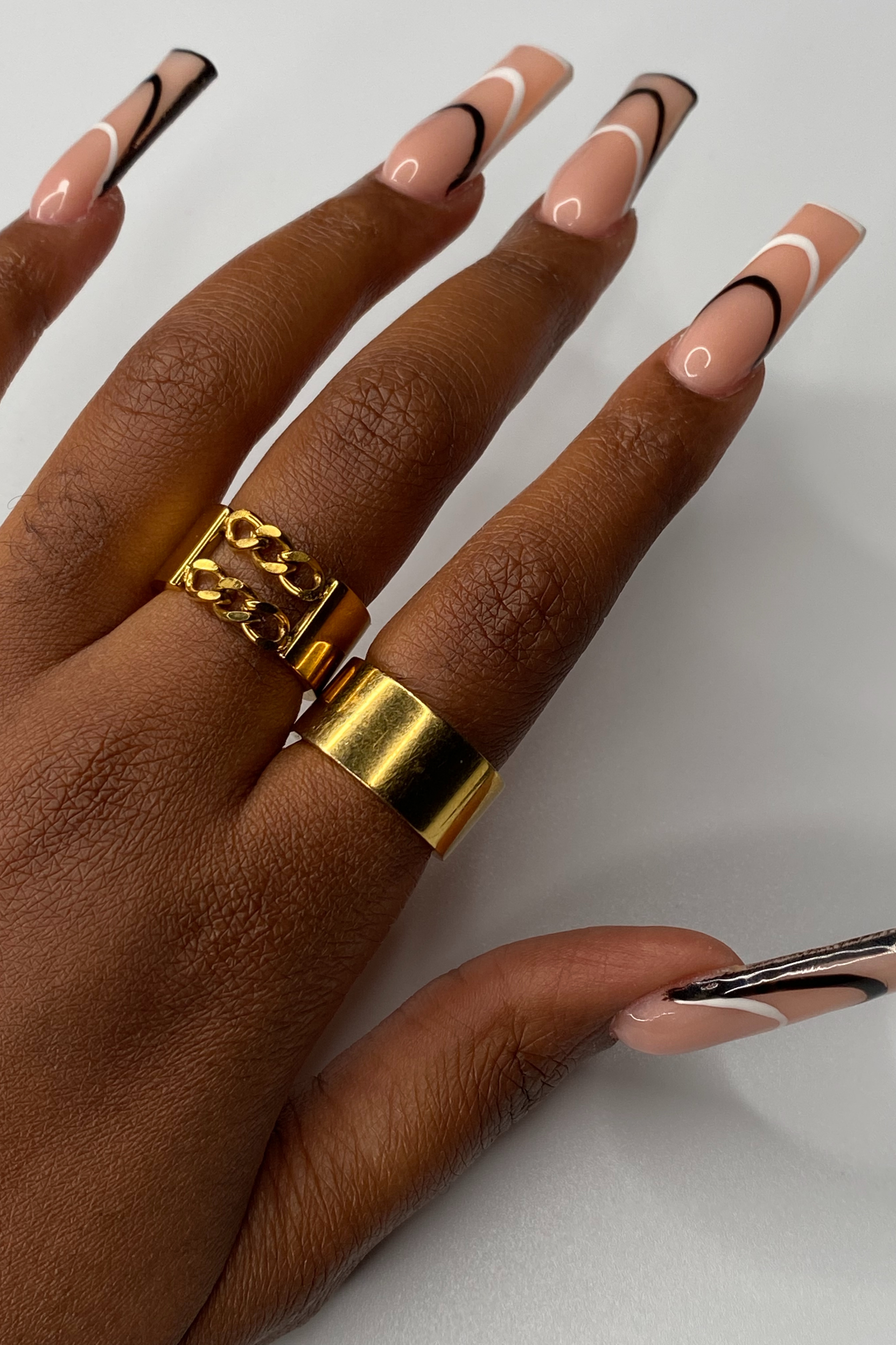 18k gold stainless steel rings worn on the index and middle finger. Double Band Stackable Ring (Upgraded) by E's Element.