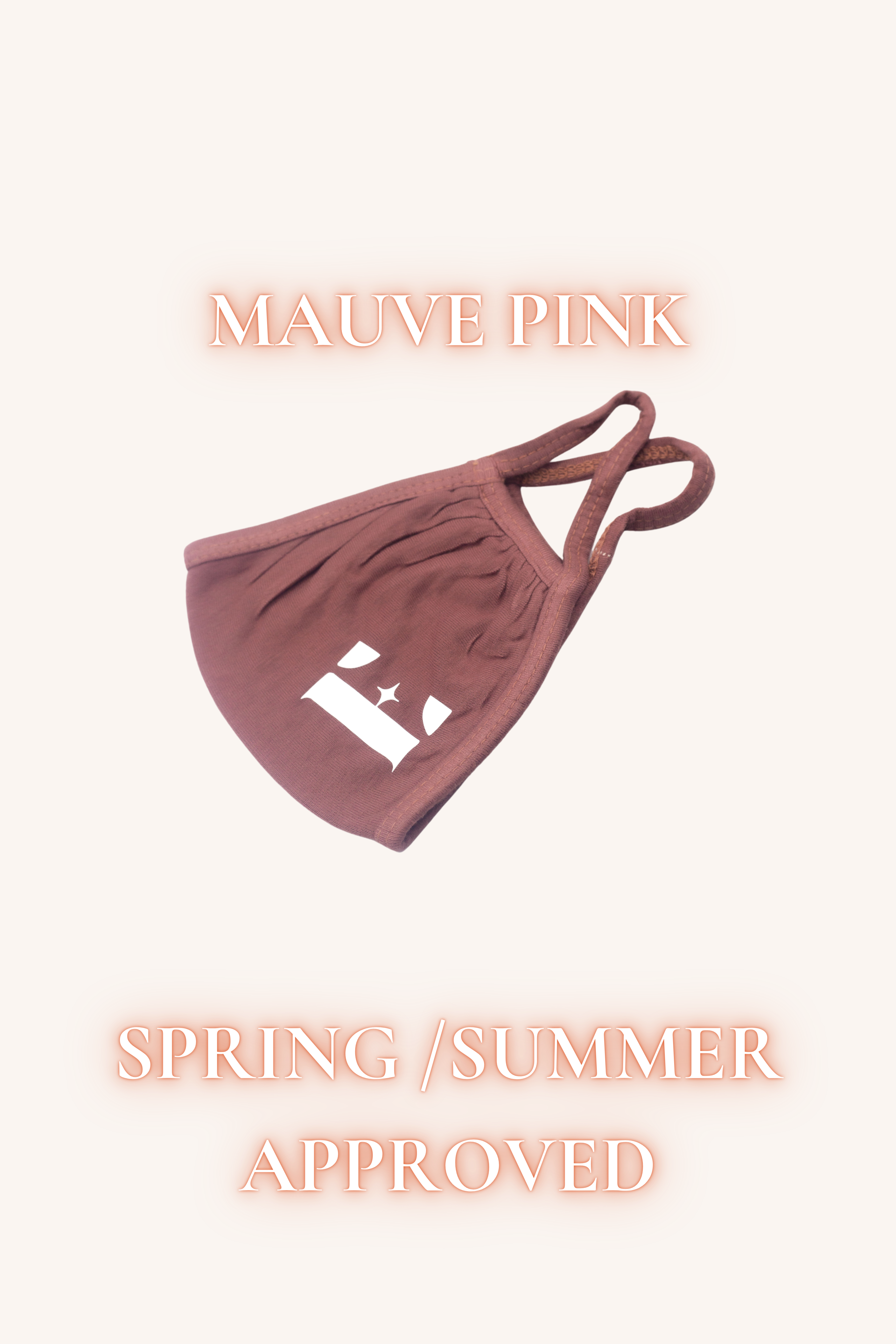 Mauve pink face mask with the E's Element logo imprinted in white. Above the mask is the word "CINNAMON". Below the mask are the words, "SPRING/SUMMER APPROVED". Reusable Masks (5 Piece) by E's Element.