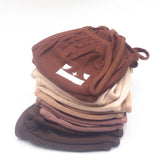 E's Element reusable face masks stacked on top of each other. The face mask colors include, different shades of brown.