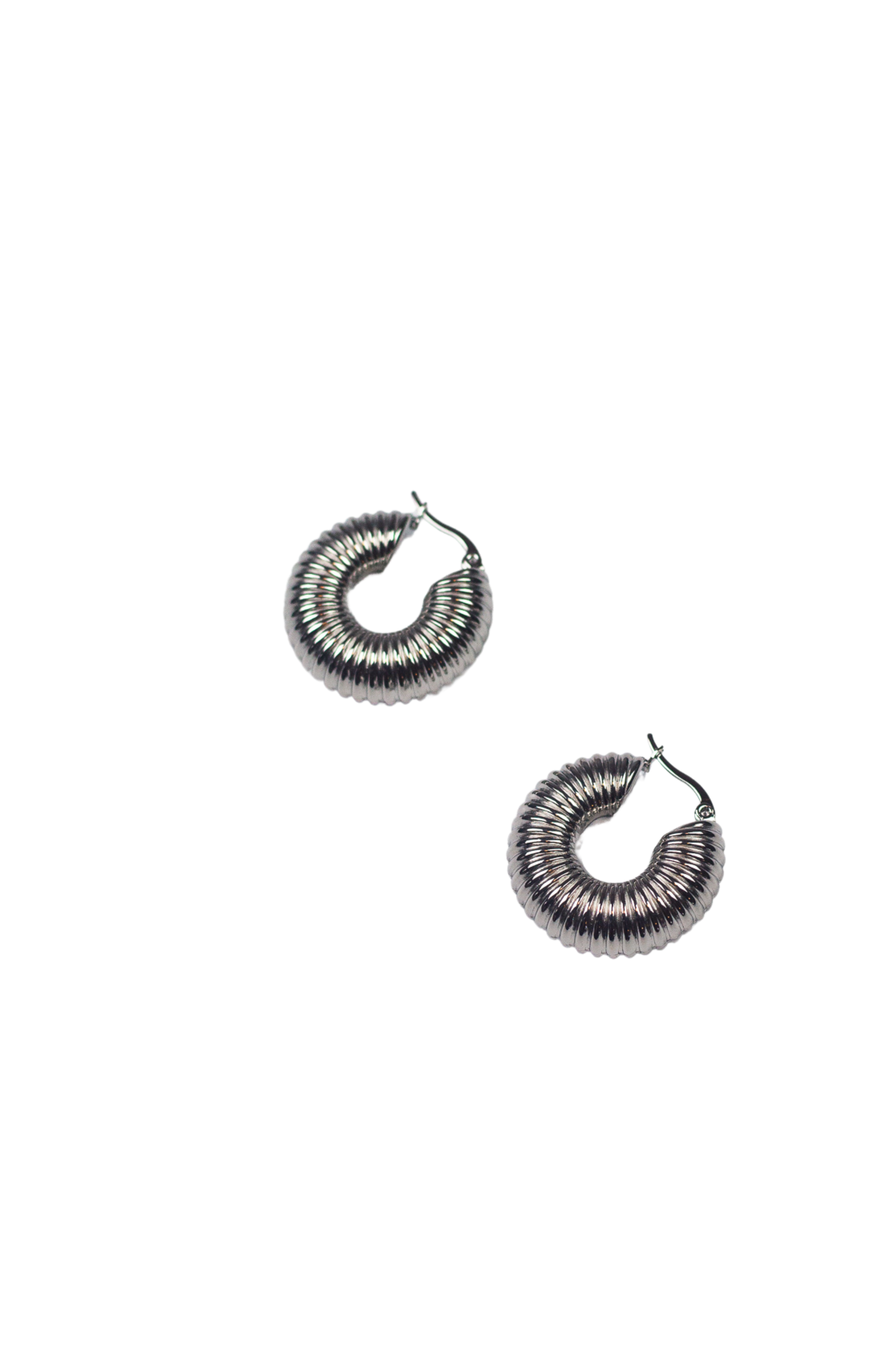 Silver stainless steel hoop earrings. Named Chunky Croissant Hoops by E's Element.